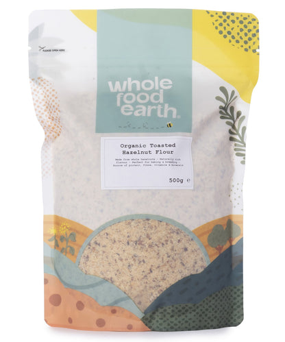 Organic toasted hazelnut flour in a 500g package, natural gluten-free flour from Whole Food Earth, ideal for baking and cooking.