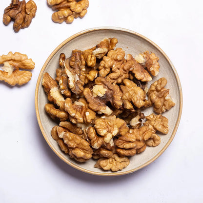 Organic walnut halves from Whole Food Earth, showing fresh, natural walnut pieces ideal for snacking or baking.