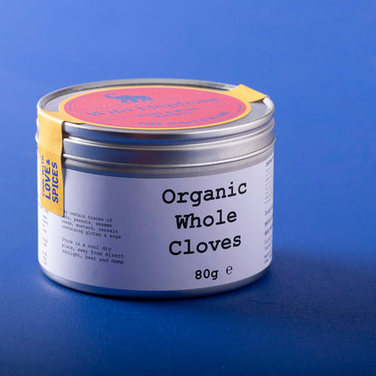 Organic Whole Cloves from Wild Elephant, 80g, in a clear jar showing dark, aromatic whole cloves, a natural herbs and spices product.