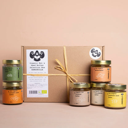 Assorted organic nut and seed butters in a selection box from Whole Food Earth, featuring various creamy and crunchy textures.