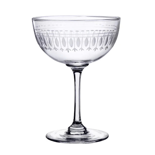Large crystal champagne saucers with oval-shaped design, elegant and clear glassware for celebrating, by The Vintage List.
