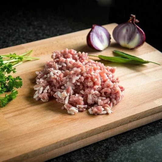Pork mince from Primrose Herd, 500g package, showing fresh ground pork in a clear plastic tray with a white background.