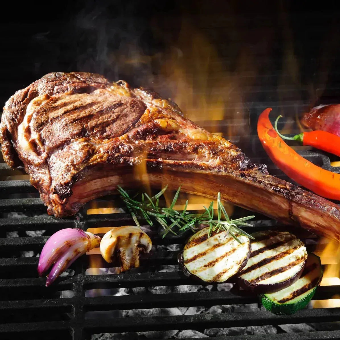 Grass-fed dry-aged beef tomahawk steak from Primrose Herd, 1kg (35oz), showing the thick cut with bone and marbled meat.