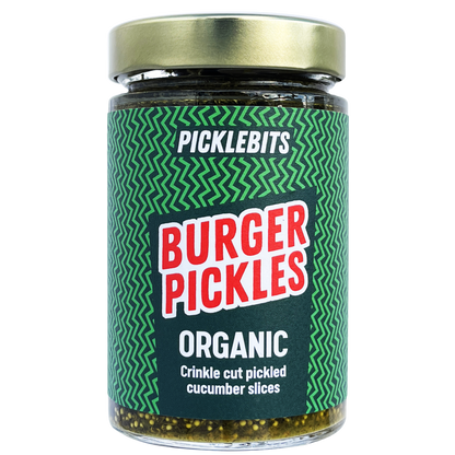 Jar of PICKLEBITS organic dill and garlic burger pickles with slices of pickles visible inside the jar.