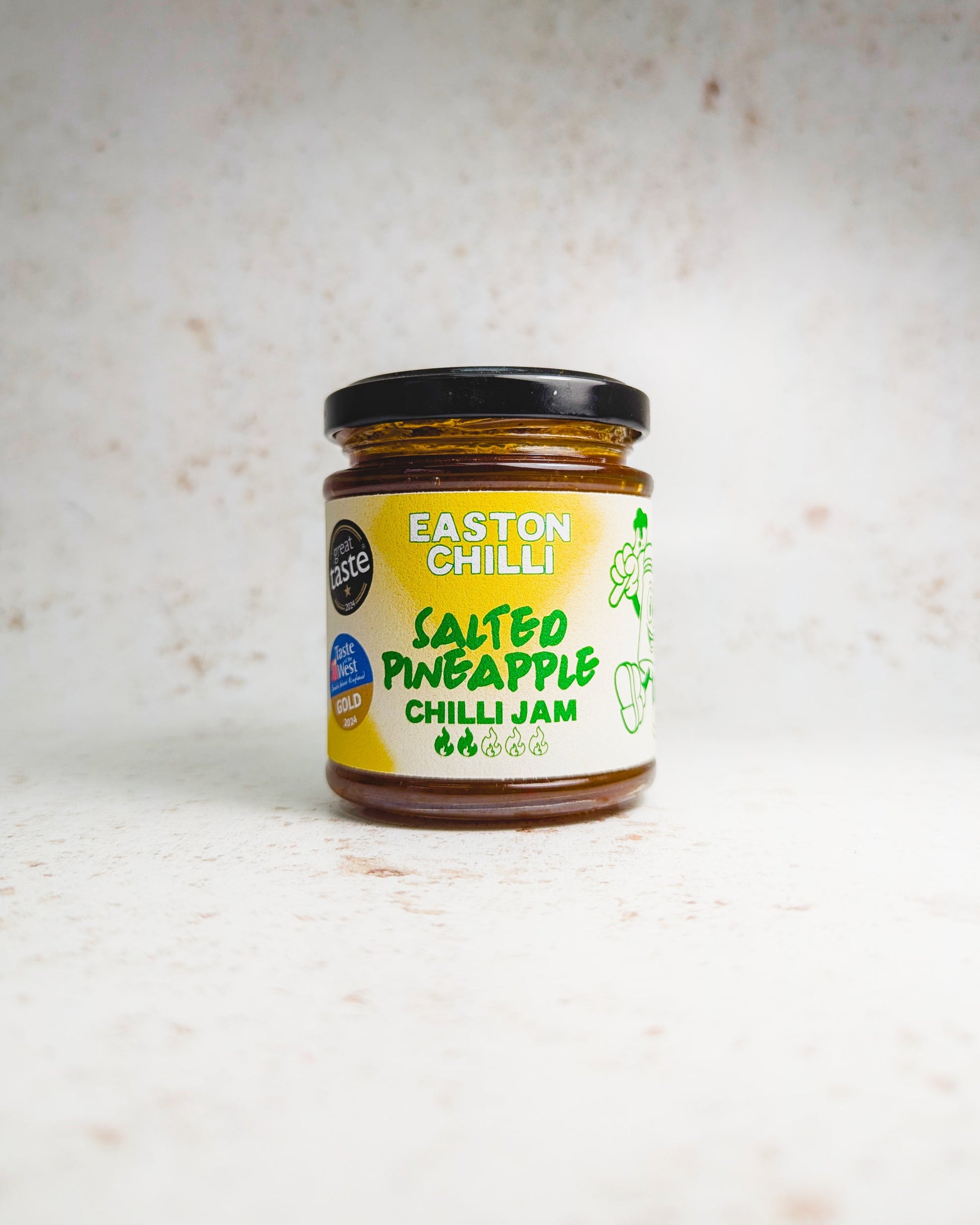 Jar of Easton Chilli Salted Pineapple Chilli Jam with visible chunks of pineapple and red chili peppers in a glass jar.