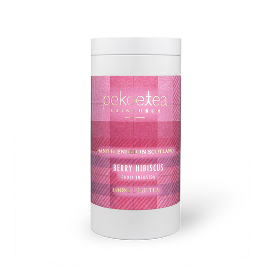 PekoeTea Edinburgh Berry Hibiscus Fruit Infusion tea caddy with colorful berry and hibiscus tea blend packaging.