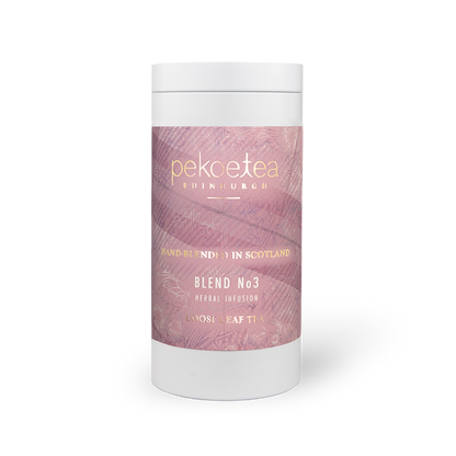 PekoeTea Edinburgh Blend No. 3 tea in a decorative caddy, showcasing loose tea leaves and packaging details.