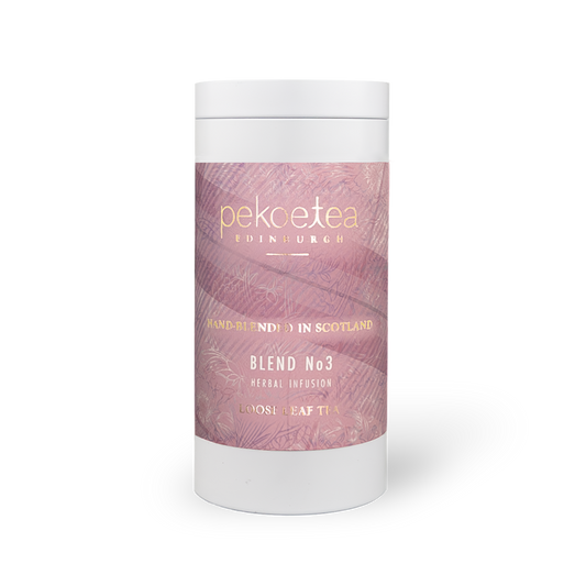 PekoeTea Edinburgh Blend No. 3 tea in a decorative caddy, showcasing loose tea leaves and packaging details.