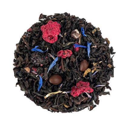 PekoeTea Edinburgh Black Forest Gateau tea leaves in a tea bag, showcasing rich black tea with hints of cherry and chocolate flavor.