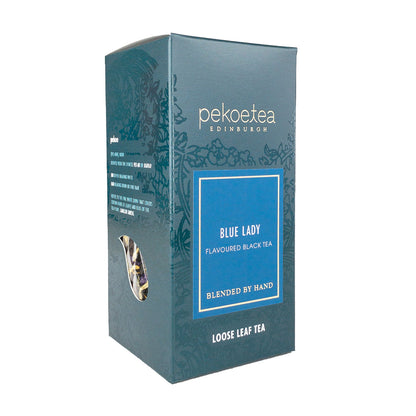 Blue Lady black tea box by PekoeTea Edinburgh featuring elegant packaging with blue accents and tea leaves visible inside.