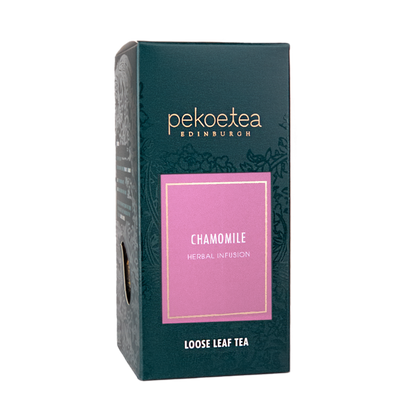 Box of PekoeTea Edinburgh chamomile herbal tea infusion with loose chamomile flowers in a natural, aromatic presentation.