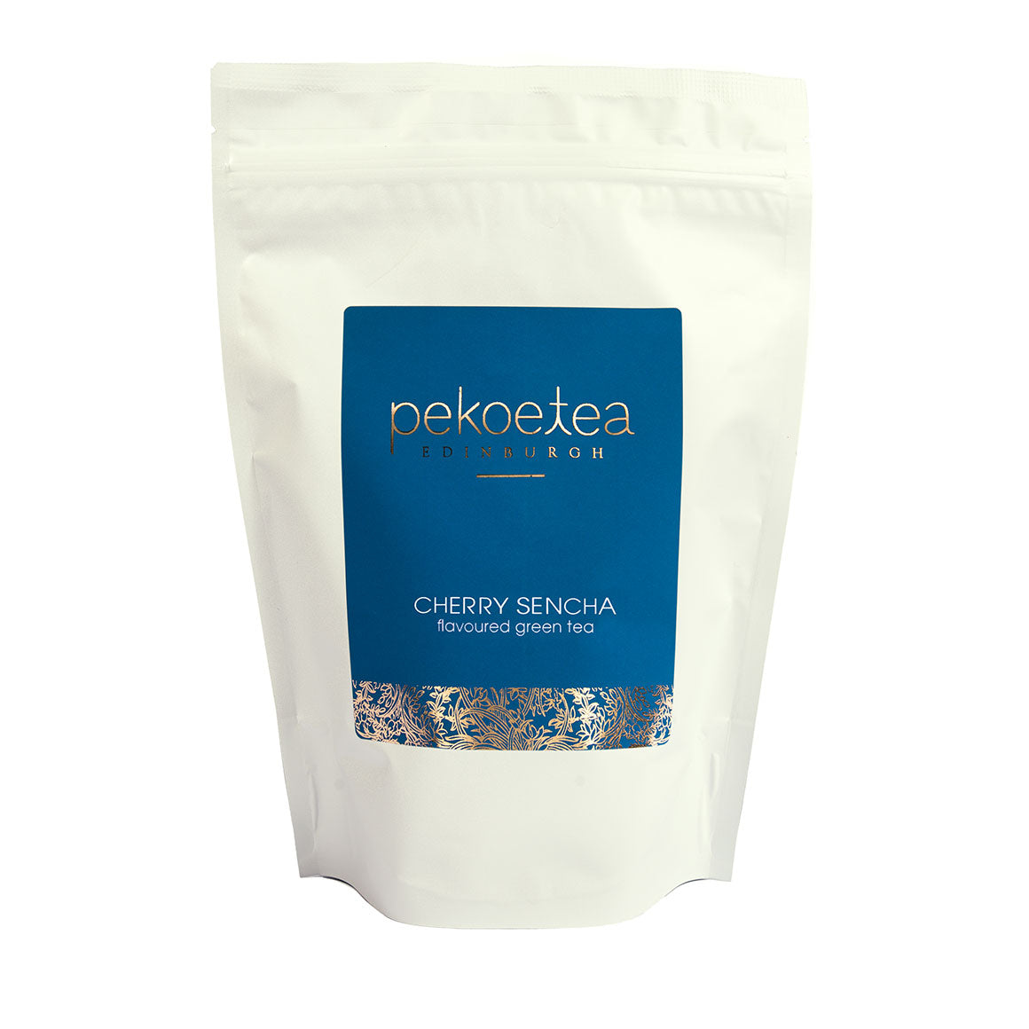 Cherry Sencha green tea in a resealable pouch by PekoeTea Edinburgh, showcasing fresh green tea leaves infused with cherry flavor.