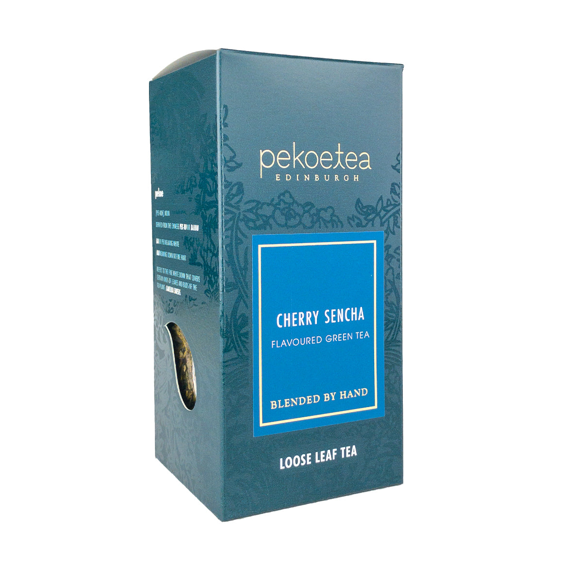 Box of PekoeTea Edinburgh Cherry Sencha Green Tea with cherry-flavored green tea leaves in a decorative tea box