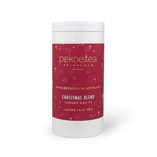 PekoeTea Edinburgh Christmas Blend tea caddy with festive holiday design and colorful Christmas-themed packaging.