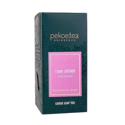 Loose leaf Cloud Catcher Fruit Infusion tea by PekoeTea Edinburgh in a resealable box with colorful packaging.
