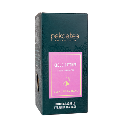 Box of PekoeTea Edinburgh Cloud Catcher fruit infusion tea bags with colorful packaging.