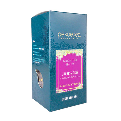 Box of PekoeTea Edinburgh Duchess Grey tea with elegant packaging, featuring a grey-themed design and tea branding.