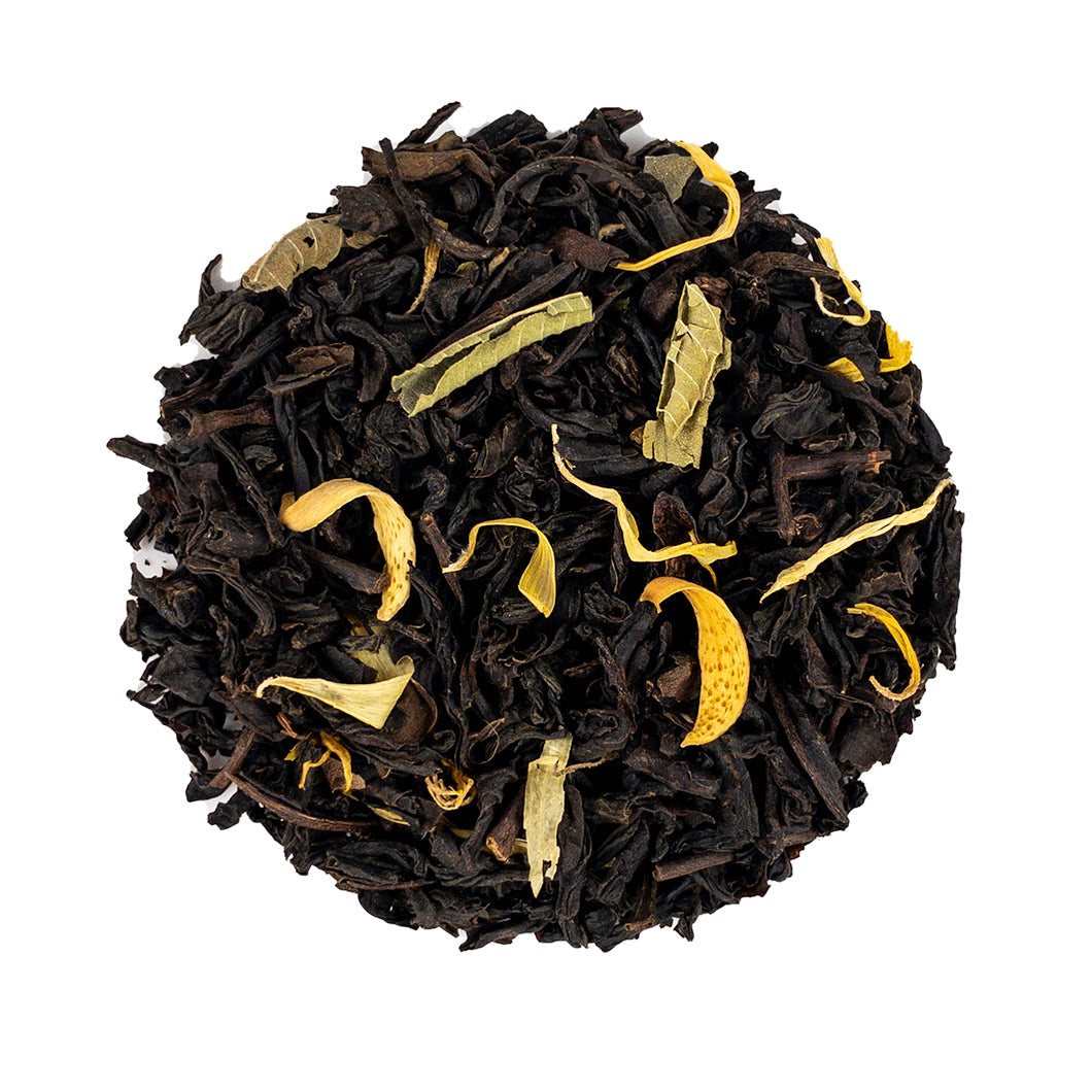Duchess Grey tea leaves by PekoeTea Edinburgh, featuring loose greyish-green tea leaves in a clear jar.