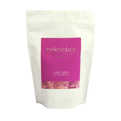 PekoeTea Edinburgh Earl Grey Blue Flower Tea in a resealable pouch, featuring aromatic tea leaves with blue cornflower petals.