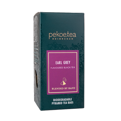 Box of PekoeTea Edinburgh Earl Grey Blue Flower Tea bags with elegant packaging and floral design.