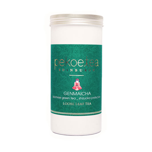 Japanese Genmaicha green tea caddy by PekoeTea Edinburgh, featuring toasted rice and green tea leaves in a decorative container.