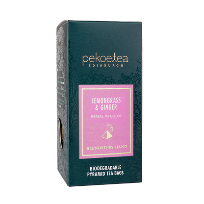 Box of PekoeTea Edinburgh Lemongrass and Ginger tea bags with a natural, herbal tea blend in a white and green packaging.
