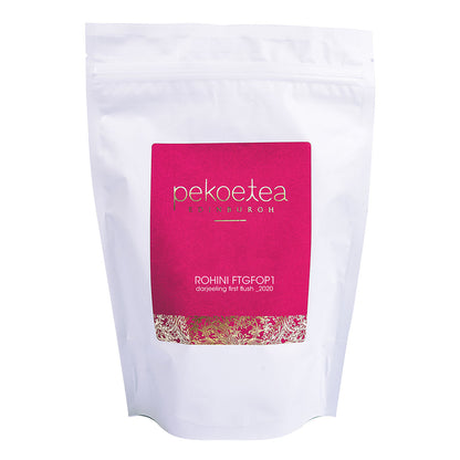 PekoeTea Edinburgh Rohini 2023 First Flush Darjeeling tea in a resealable pouch, showcasing fresh tea leaves and packaging.