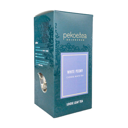 PekoeTea Edinburgh Pai Mu Dan White Tea in a decorative box, showcasing the delicate white tea leaves and packaging.