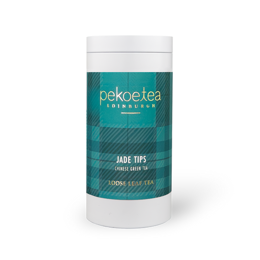 PekoeTea Edinburgh Xin Yang Mao Jian green tea in a caddy, featuring delicate jade green tea tips and fresh, vibrant leaves.