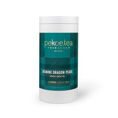 PekoeTea Edinburgh Jasmine Dragon Pearl green tea in a decorative caddy, featuring delicate pearl-shaped tea leaves and jasmine blossoms.