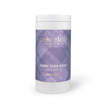 Fujian Jasmine Silver Needle White Tea in a decorative caddy, showcasing delicate white tea leaves infused with jasmine aroma.