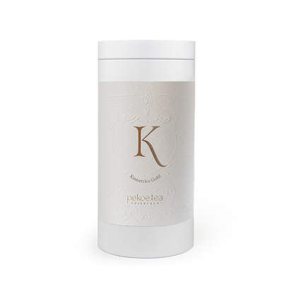 PekoeTea Edinburgh Kinnettles Gold Scottish Grown Tea in a decorative caddy, showcasing rich golden tea leaves.