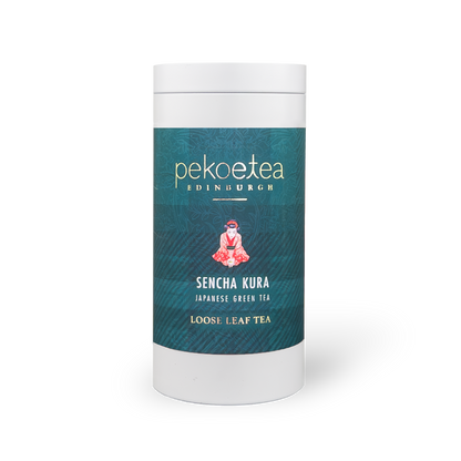 Sencha Kura Green Tea in a PekoeTea Edinburgh caddy, showcasing fresh green tea leaves in a decorative container.