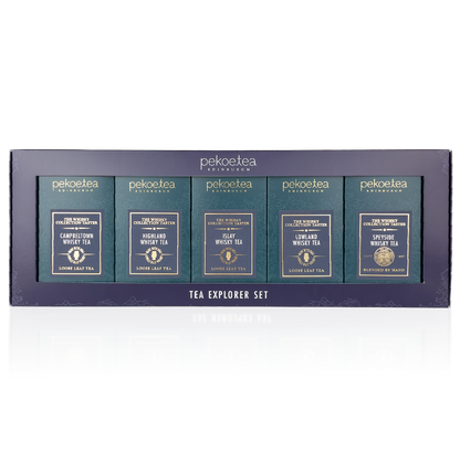 PekoeTea Edinburgh Whisky Tea Collection Explorer Set featuring assorted tea tins with whisky-inspired flavors and elegant packaging.