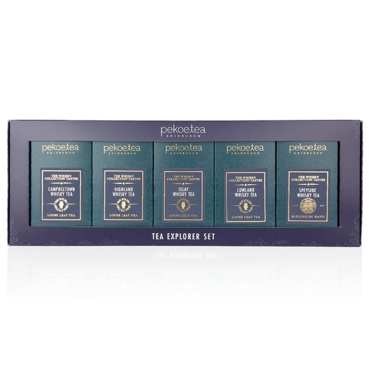 PekoeTea Edinburgh Whisky Tea Collection Explorer Set featuring assorted tea tins with whisky-inspired flavors and elegant packaging.