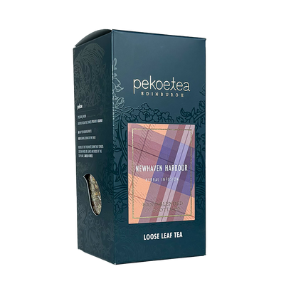 Loose leaf tea box labeled Newhaven Harbour by PekoeTea Edinburgh, featuring a detailed design inspired by the harbor scene.
