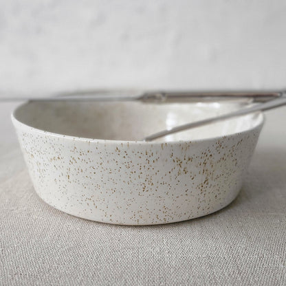 Pepper White Classic Pasta Bowl by Katie L Thompson Designs with a knife and fork on a white background.
