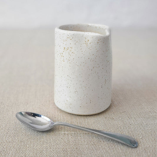 Pepper White Classic Small Jug by Katie L Thompson Designs with a matching spoon, ideal for serving sauces or condiments.