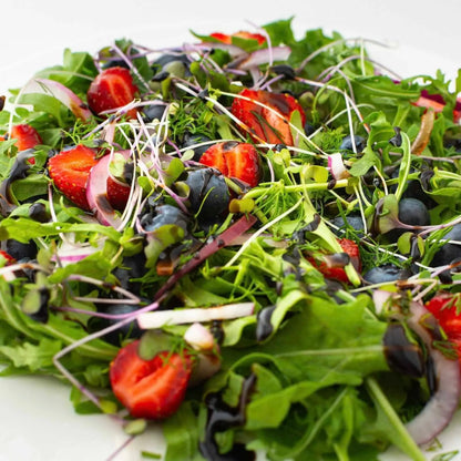 Hot Star Honey Classic Balsamic Honey Glaze drizzled over a fresh salad, showcasing its rich, glossy balsamic glaze texture.