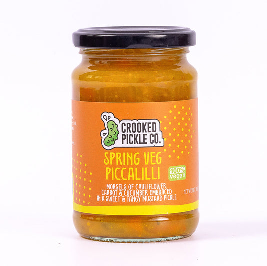 Piccalilli served alongside a pork pie and cheddar cheese
