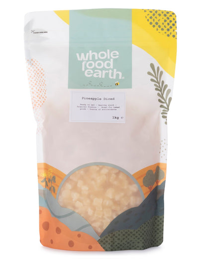 Dried pineapple diced pieces from Whole Food Earth, showing golden yellow chunks of dried pineapple on a white background.