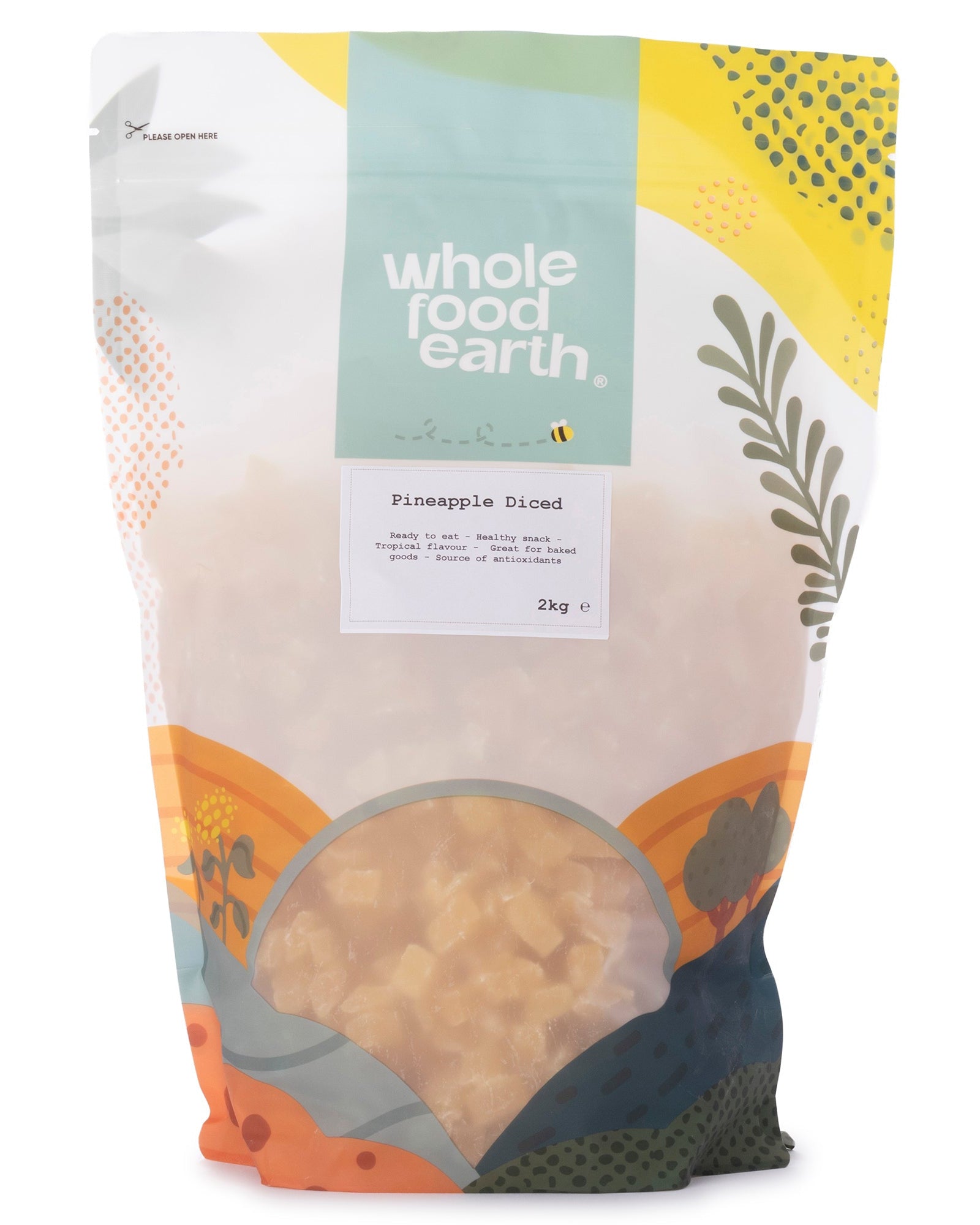 Dried pineapple diced pieces in a clear container, vibrant yellow fruit with a textured surface, from Whole Food Earth dried fruits.