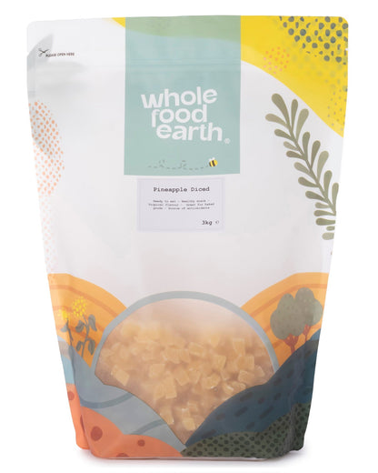 Dried pineapple diced pieces in a clear container, natural golden color, from Whole Food Earth dried fruits collection.
