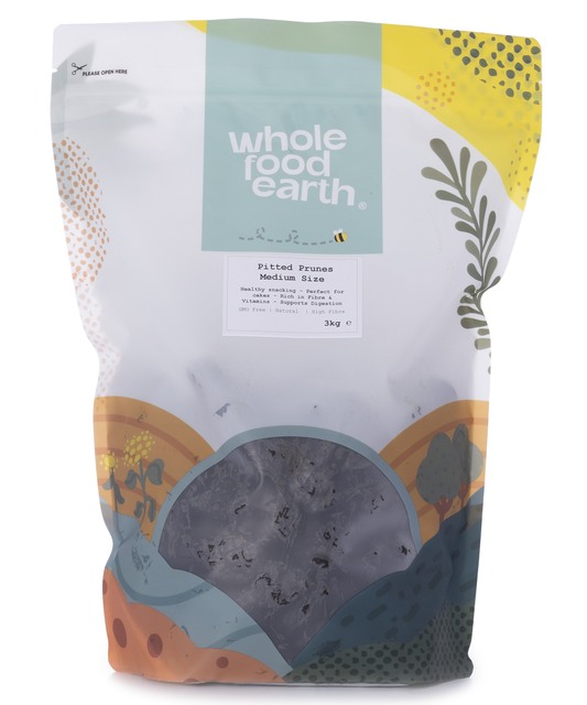 Medium-sized pitted prunes from Whole Food Earth, dried fruit with smooth, dark, and glossy appearance.