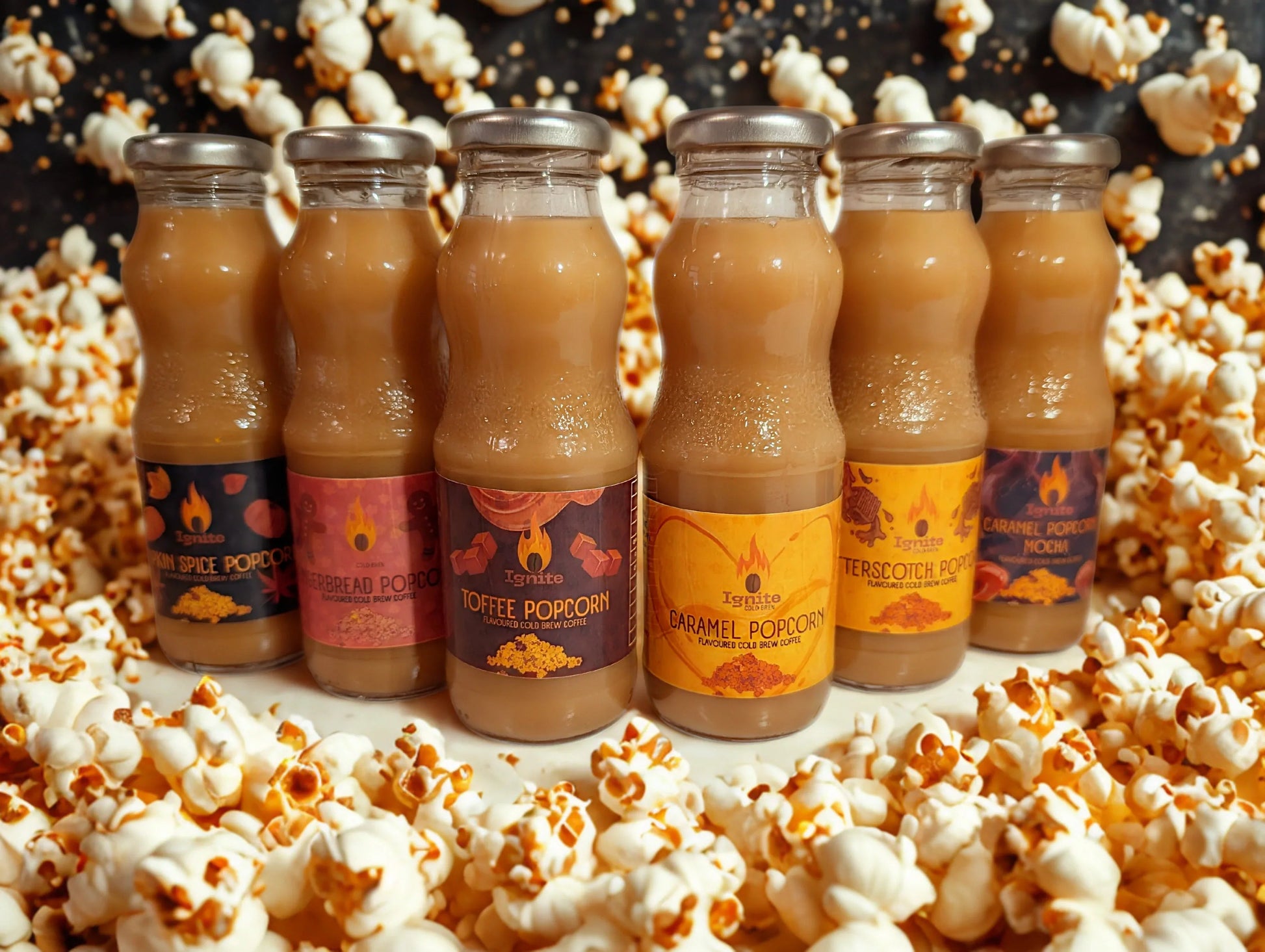Cold brew pack with six popcorn-inspired coffee drinks from Ignite Coffee Co, featuring creamy textures and popcorn flavor accents.