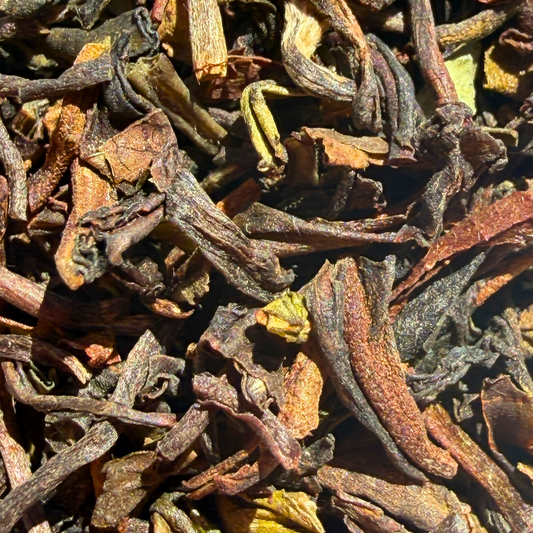 Loose leaf black tea from Porter Hill Tea Company, Margaret's Hope Darjeeling 2nd Flush TGFOP, showcasing golden tips and fragrant leaves.