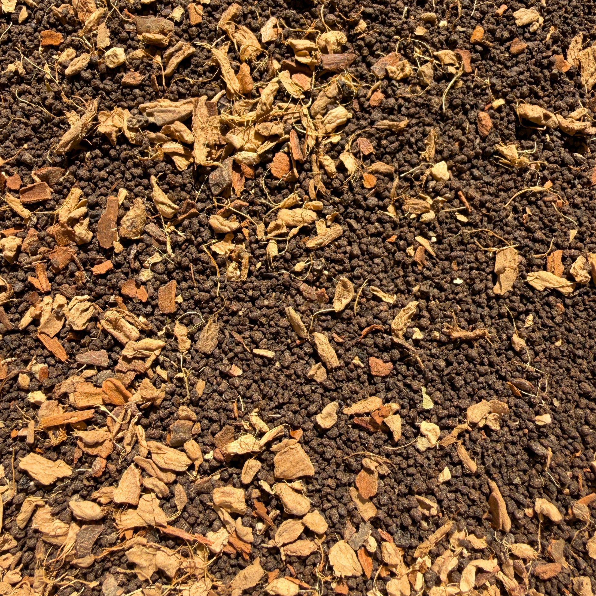 Loose leaf decaf masala chai black tea by Porter Hill Tea Company with aromatic spices and rich, flavorful tea leaves.