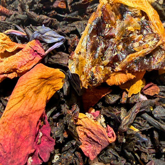 Loose leaf Pearl Grey black tea with lemon flavor from Porter Hill Tea Company, showing grey and black tea leaves.