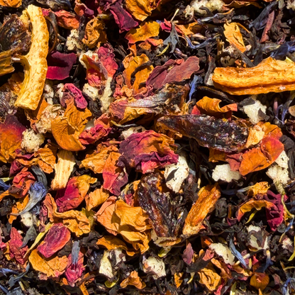 Loose leaf Pearl Grey Black Tea by Porter Hill Tea Company with lemon aroma, showcasing grey pearls and tea leaves.
