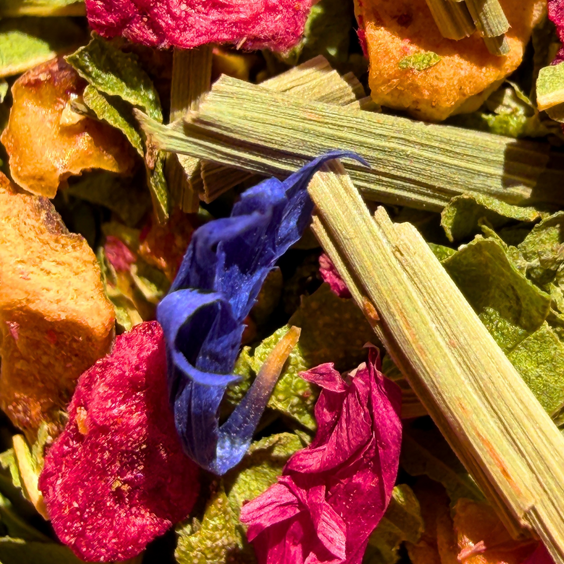 Loose leaf Raspberry Lemon Verbena herbal tea from Porter Hill Tea Company with vibrant raspberry and lemon verbena leaves.